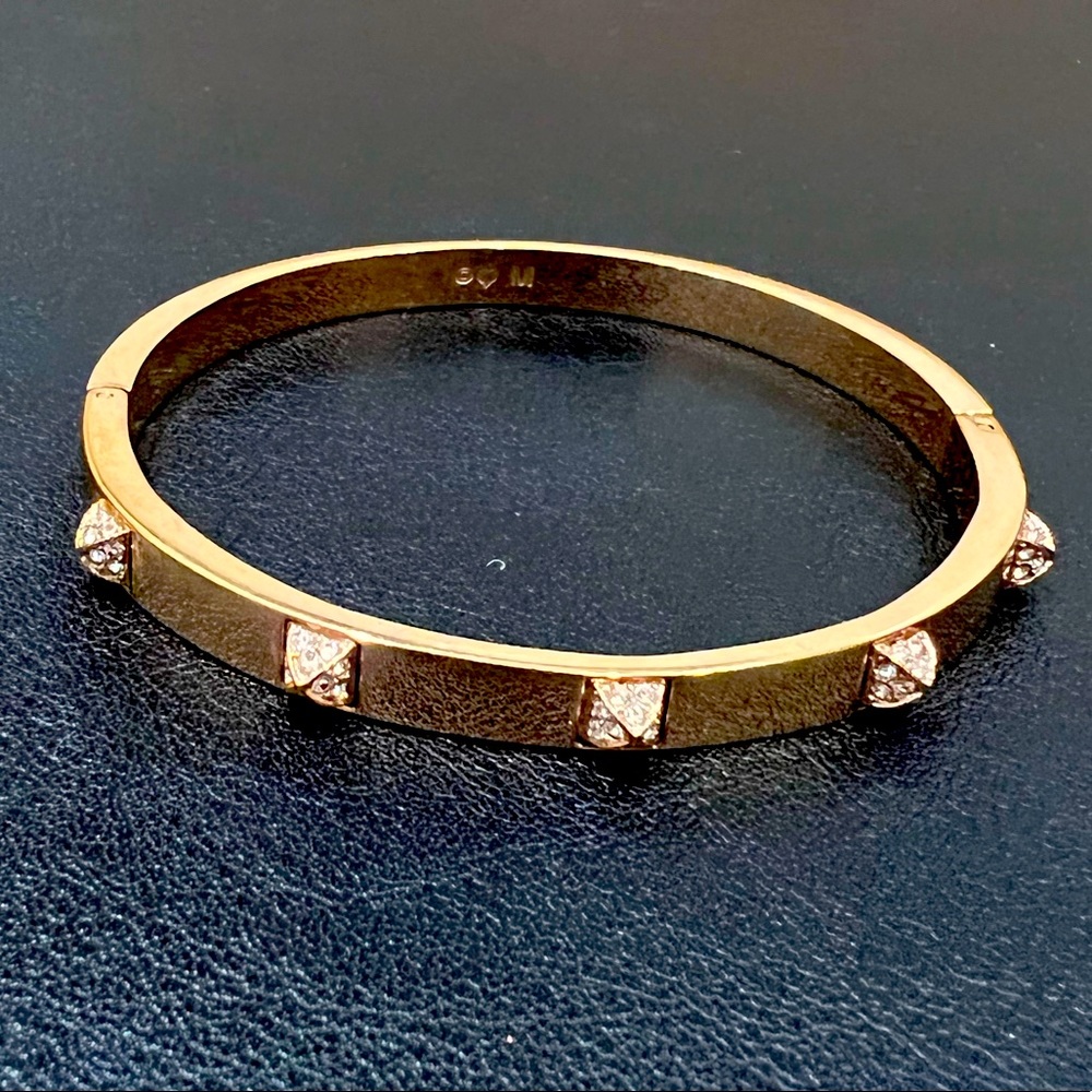 Swarovski rose gold toned bangle with Jeweled embellishments